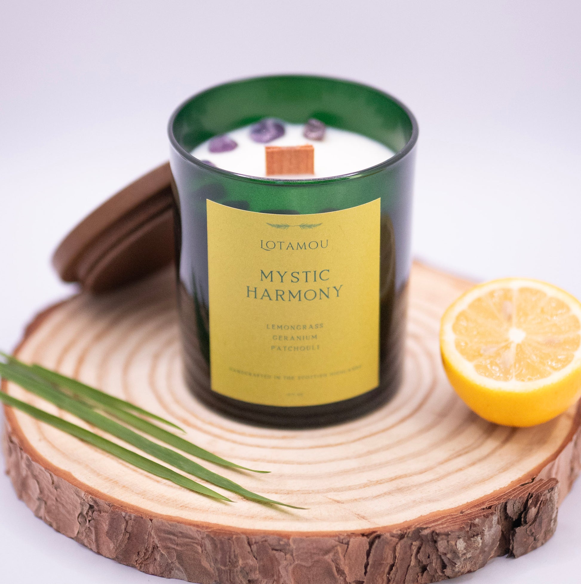 Lemongrass and Ginger scented candle in jar with the silicone-free wooden lid and amethyst crystals. Soy wax candle with wooden wick. Hand poured in Scottish Highlands. Vegan friendly