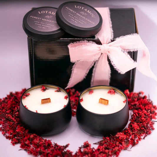 Scented soy candles in a matte black tins with lids.