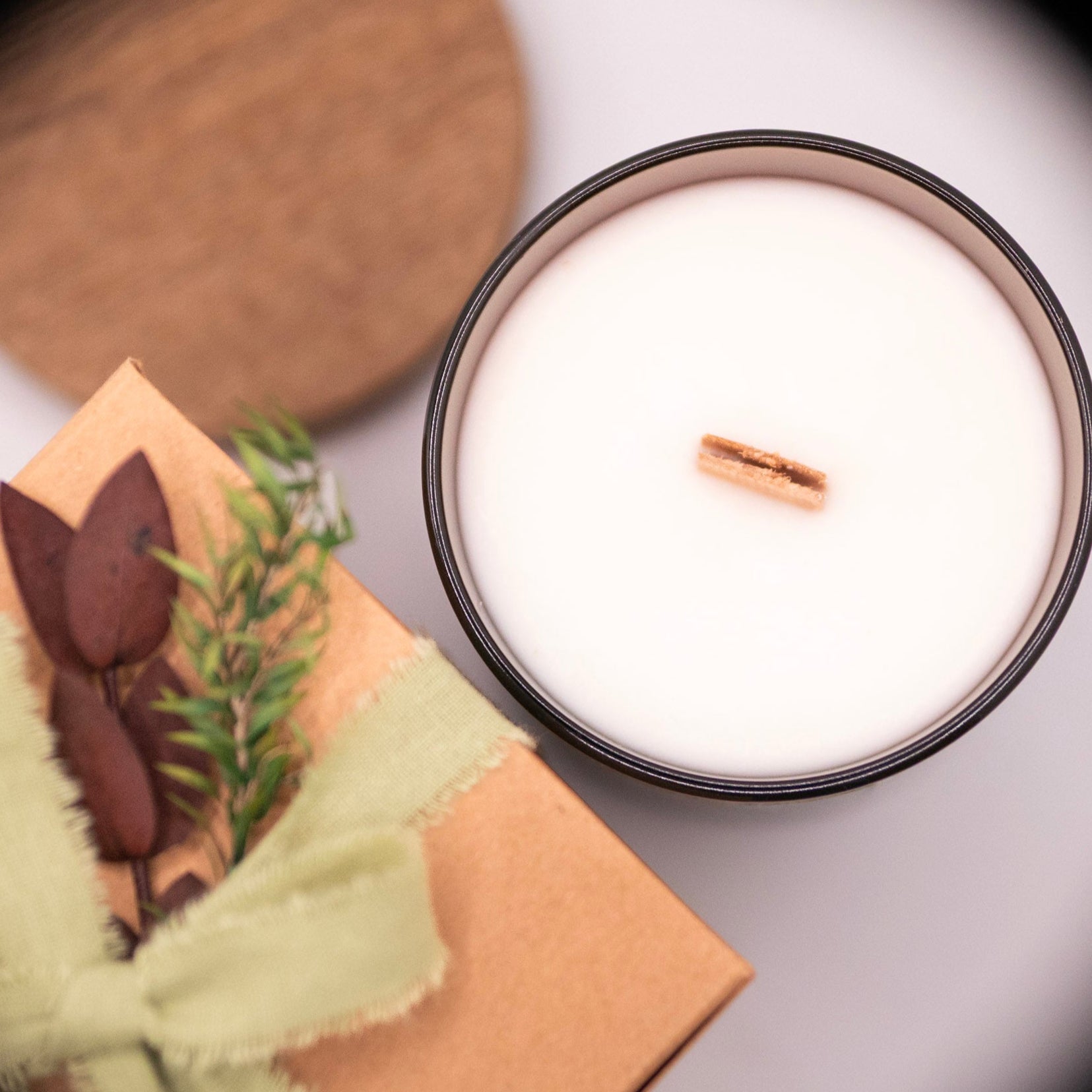 The Magic Woods scented candle, infused with the fragrance of Enchanted Forest. 100% natural soy candle with wooden wick and silicone-free lid.