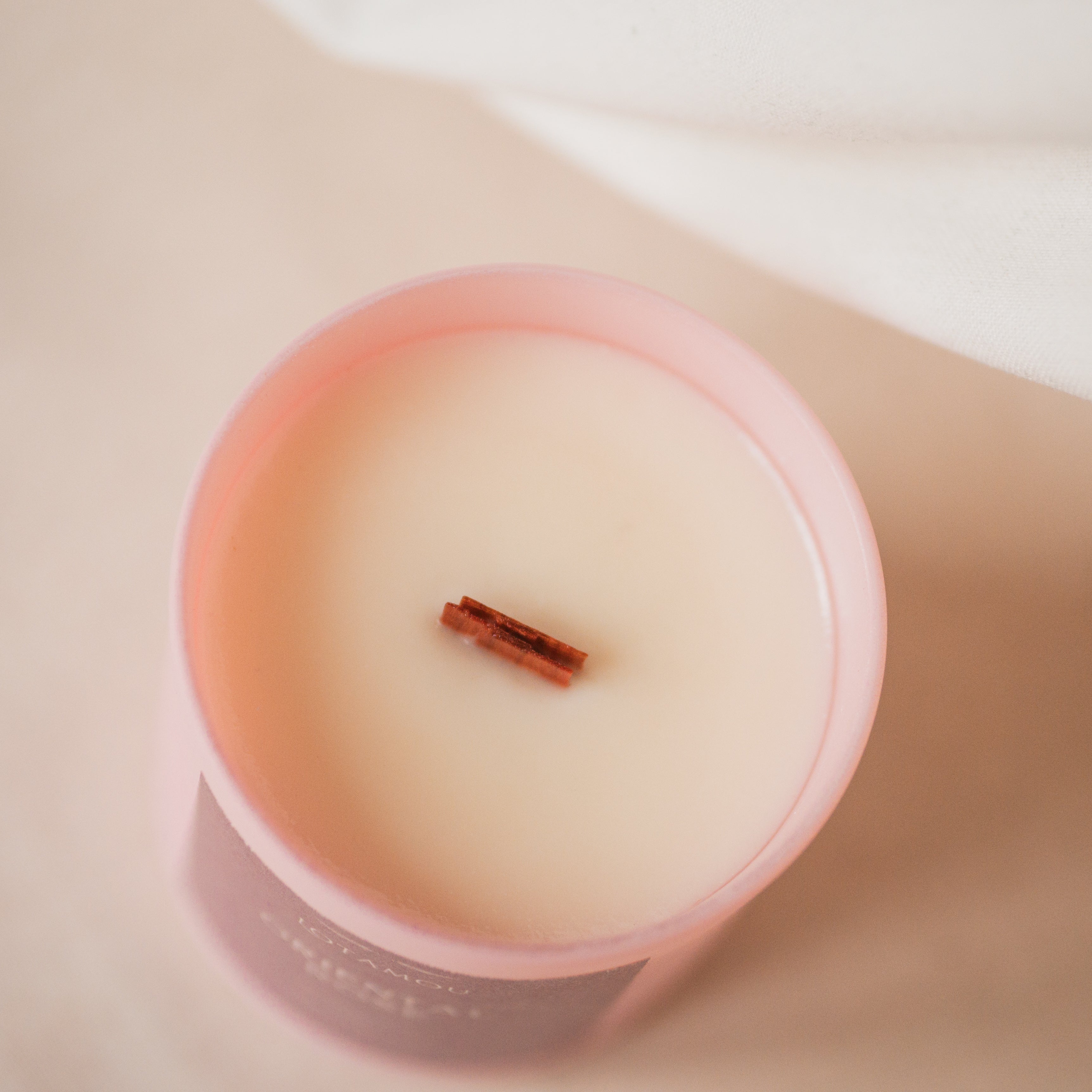 Pink Pepper and Rose Scented Candle with wooden wick. Pure soy wax and natural fragrance oils.